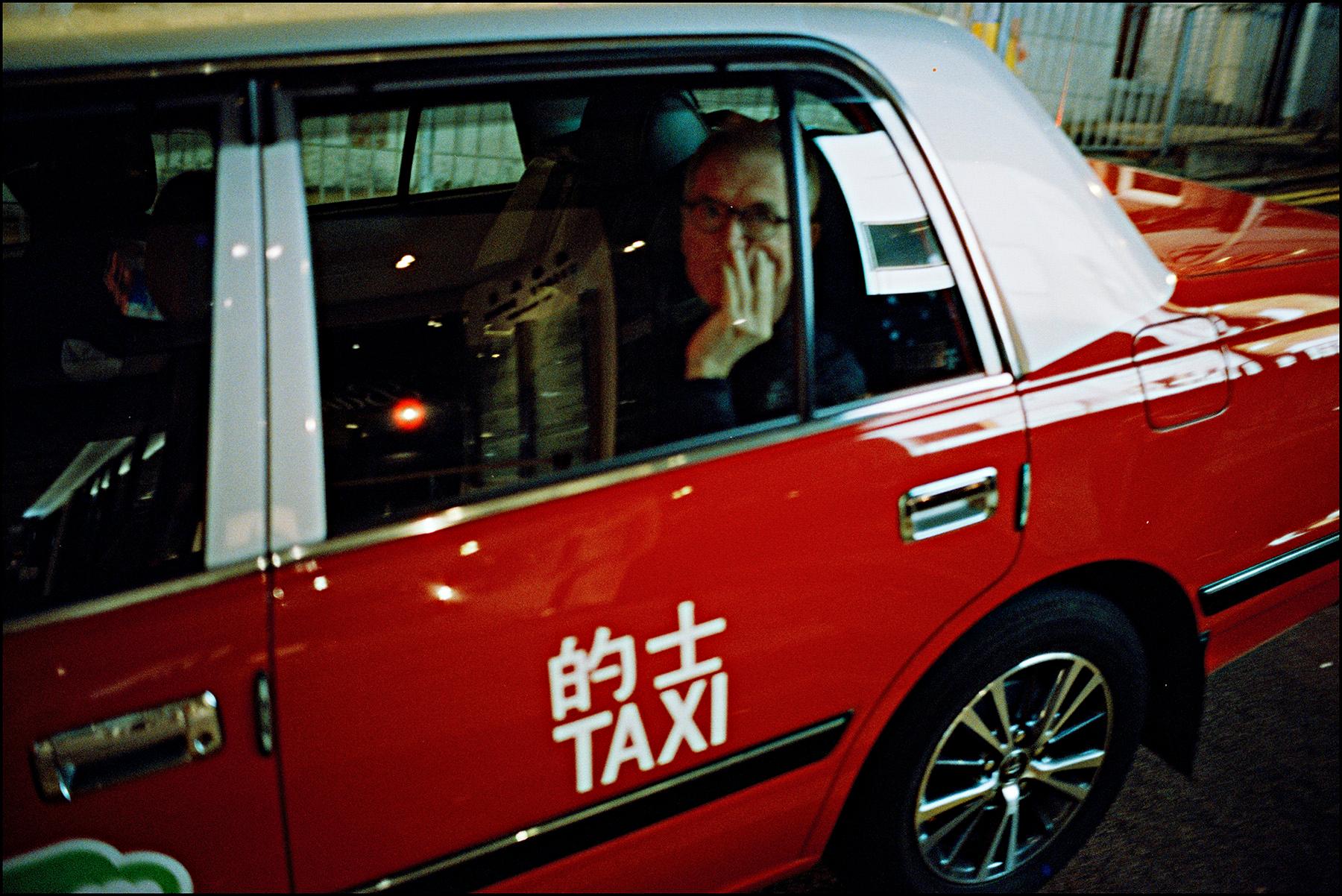 a man in a taxi