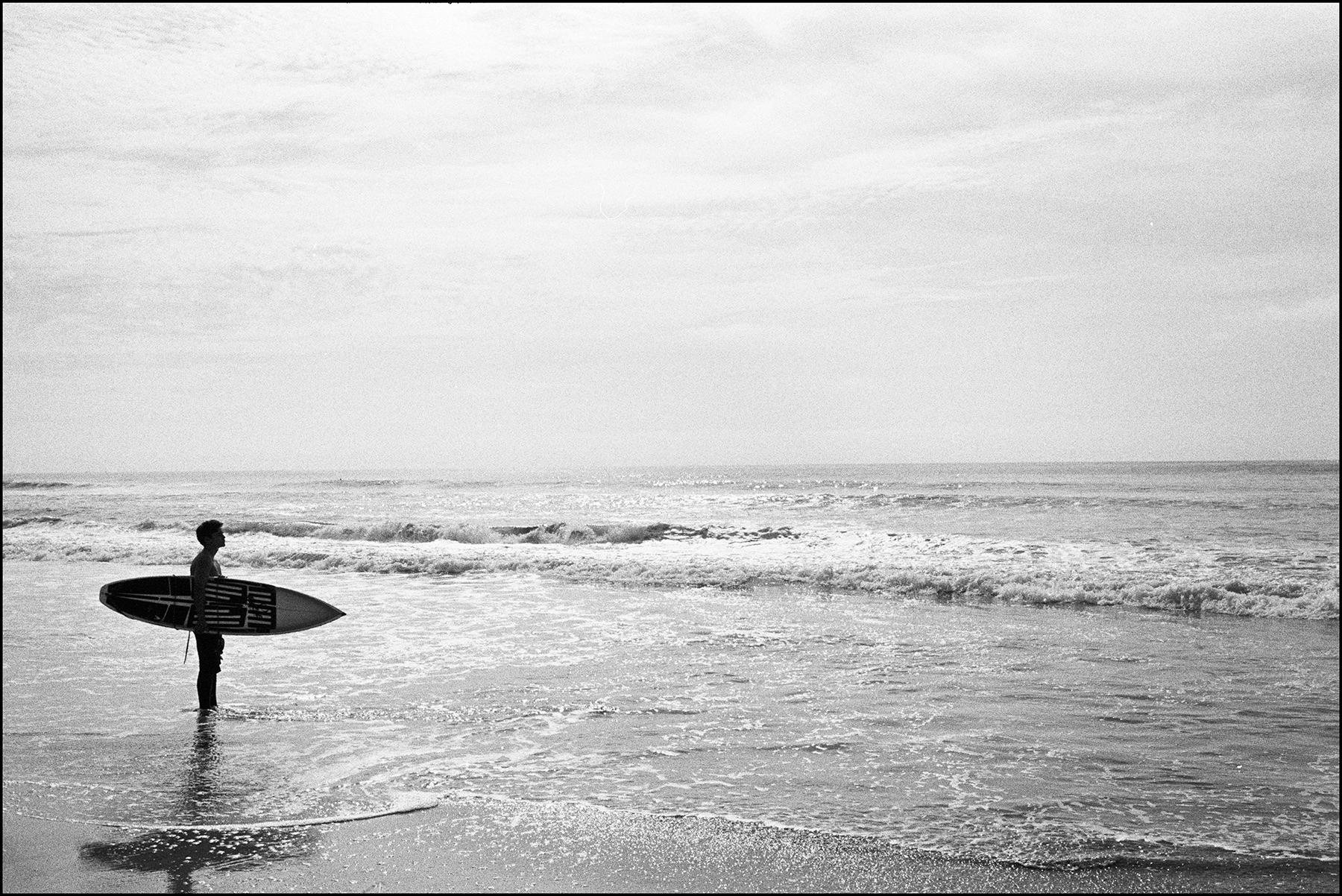 a surfer at the beach